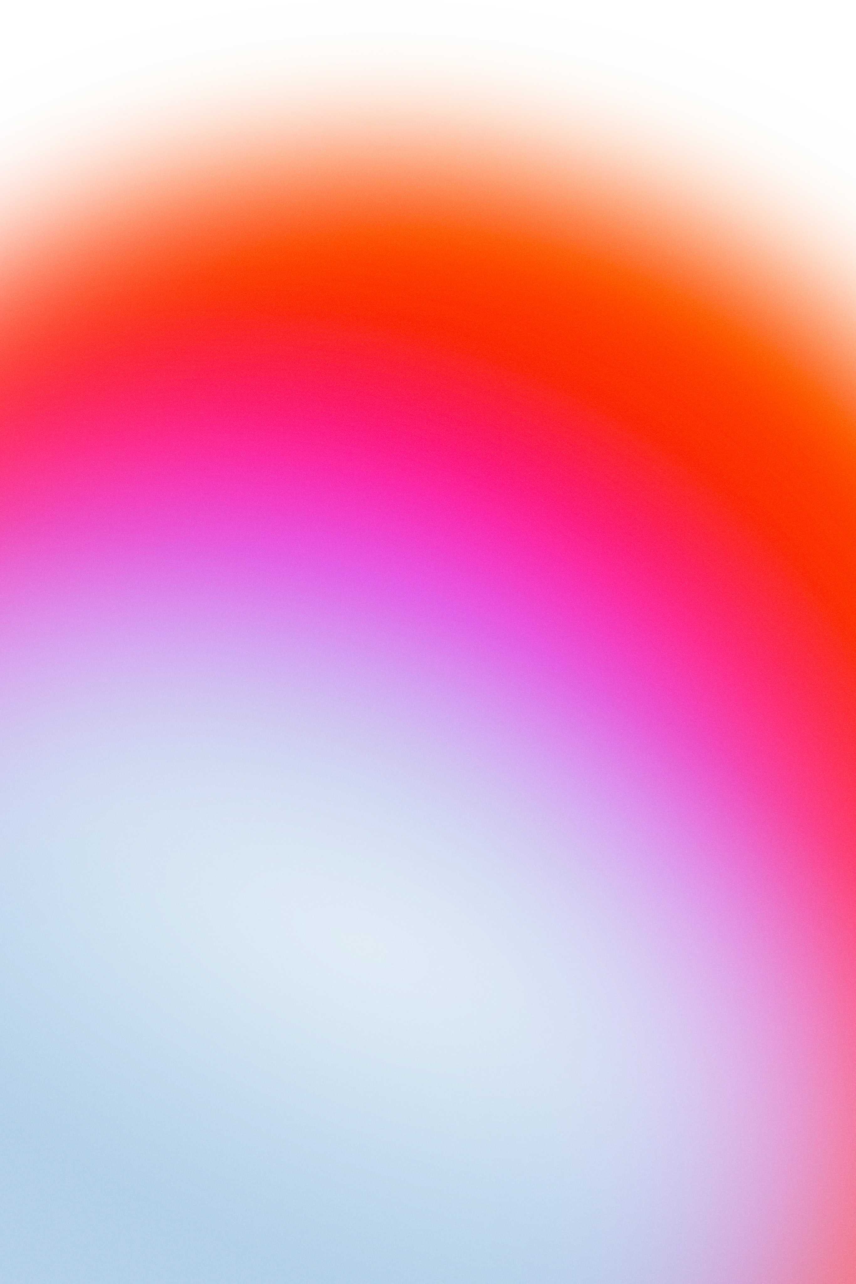 A grainy gradient from light blue to orange